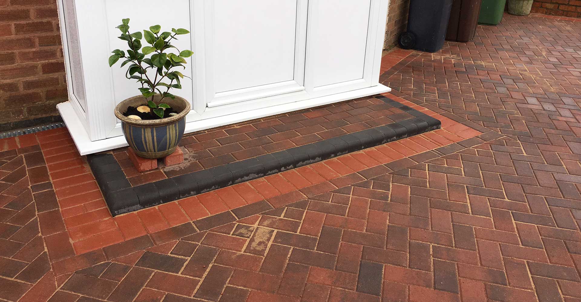 Block paving driveway and brick step